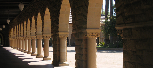 Image of arches and columns around a courtyard at Stanford University